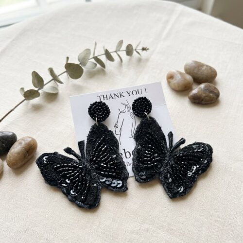 The Black Beaded Butterfly